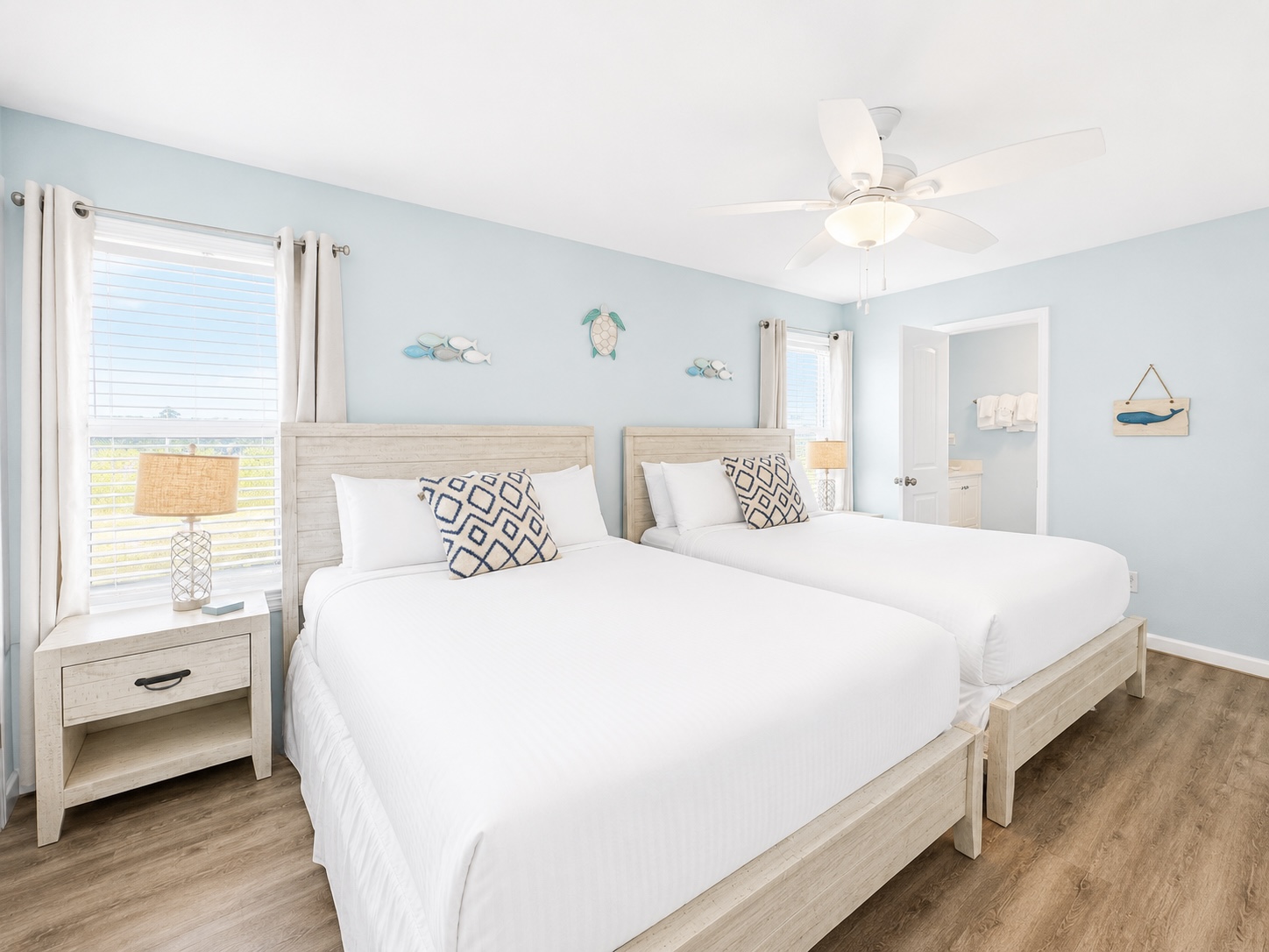 Bedroom with two queen beds at Good Tides Only
